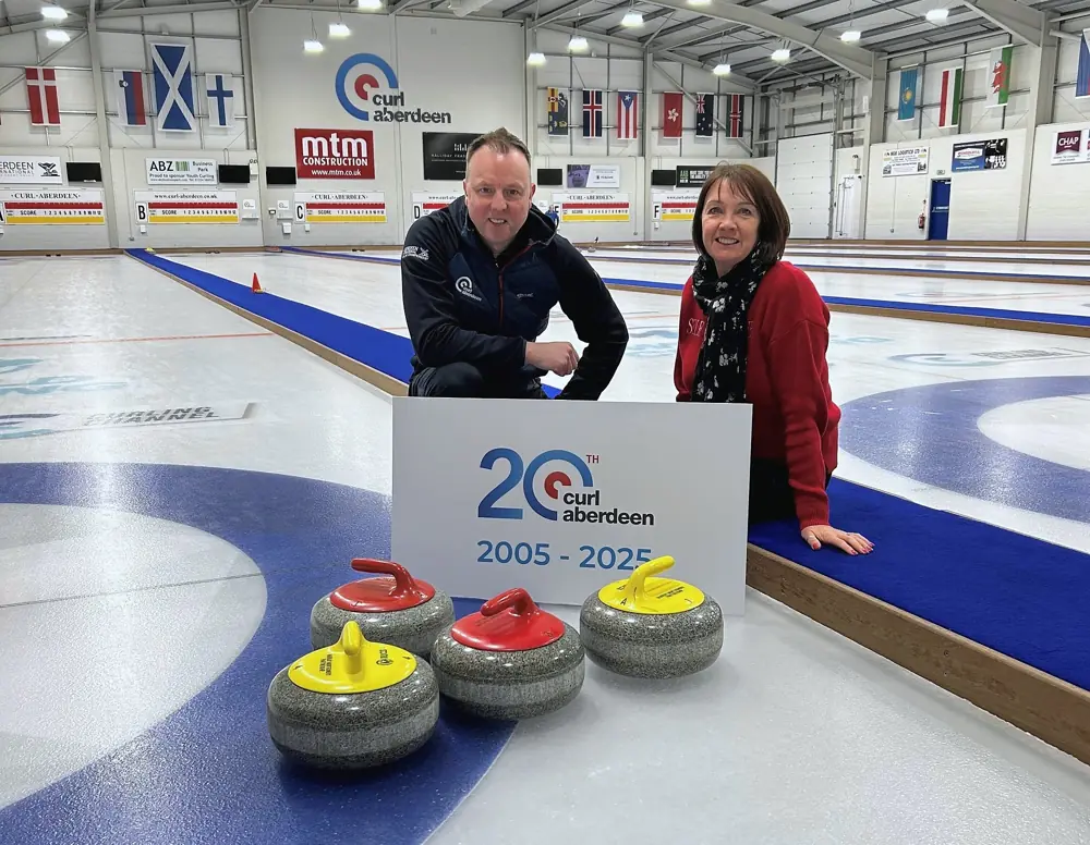 The 20th anniversary sign on the ice